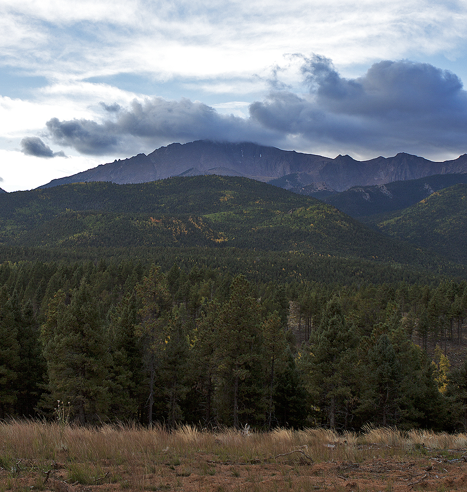 Cloud hovering above the peak (only)