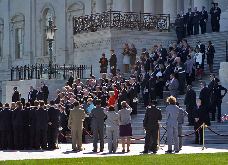 Some event on the east steps of the Capitol; Reps and Senators