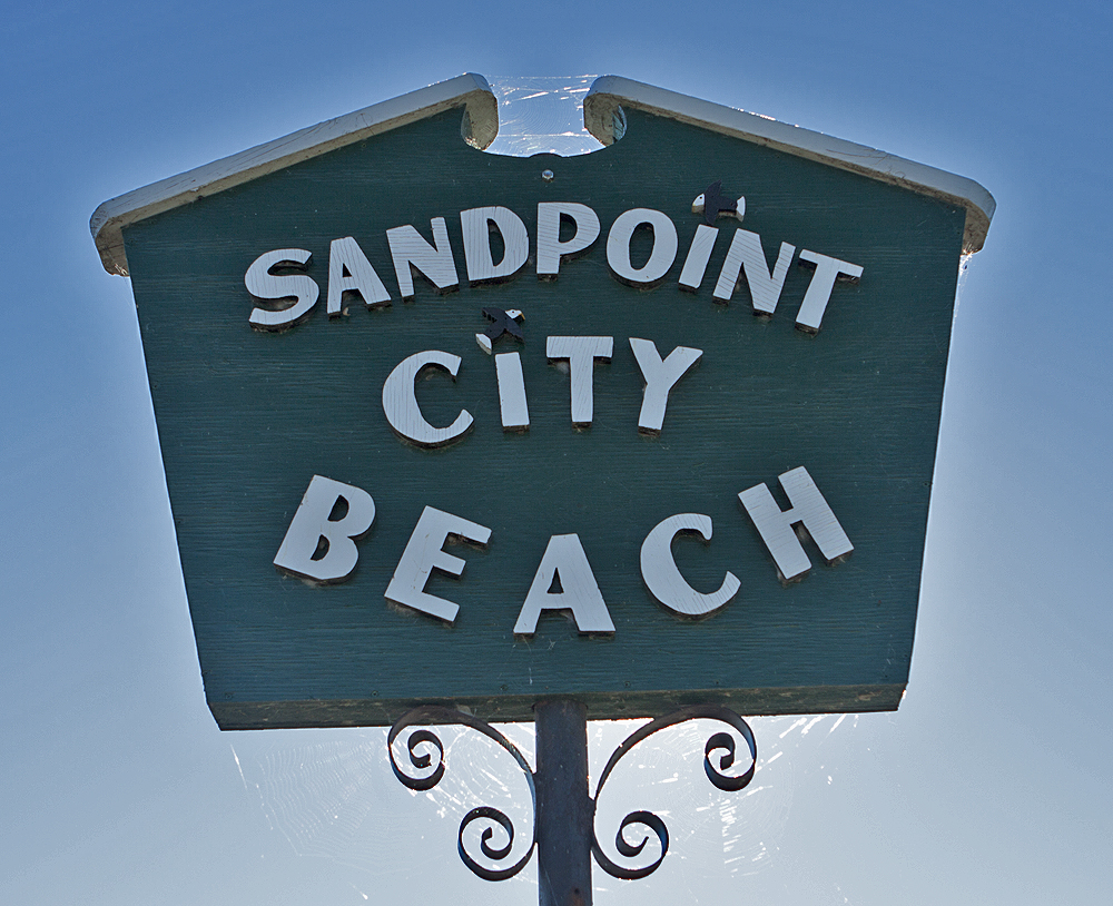 Sandpoint Beach sign - notice the cobwebs