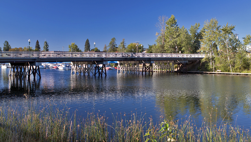 Bridge from city to lake